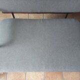 Two-seater sofa in fabric, metal and wooden armrests