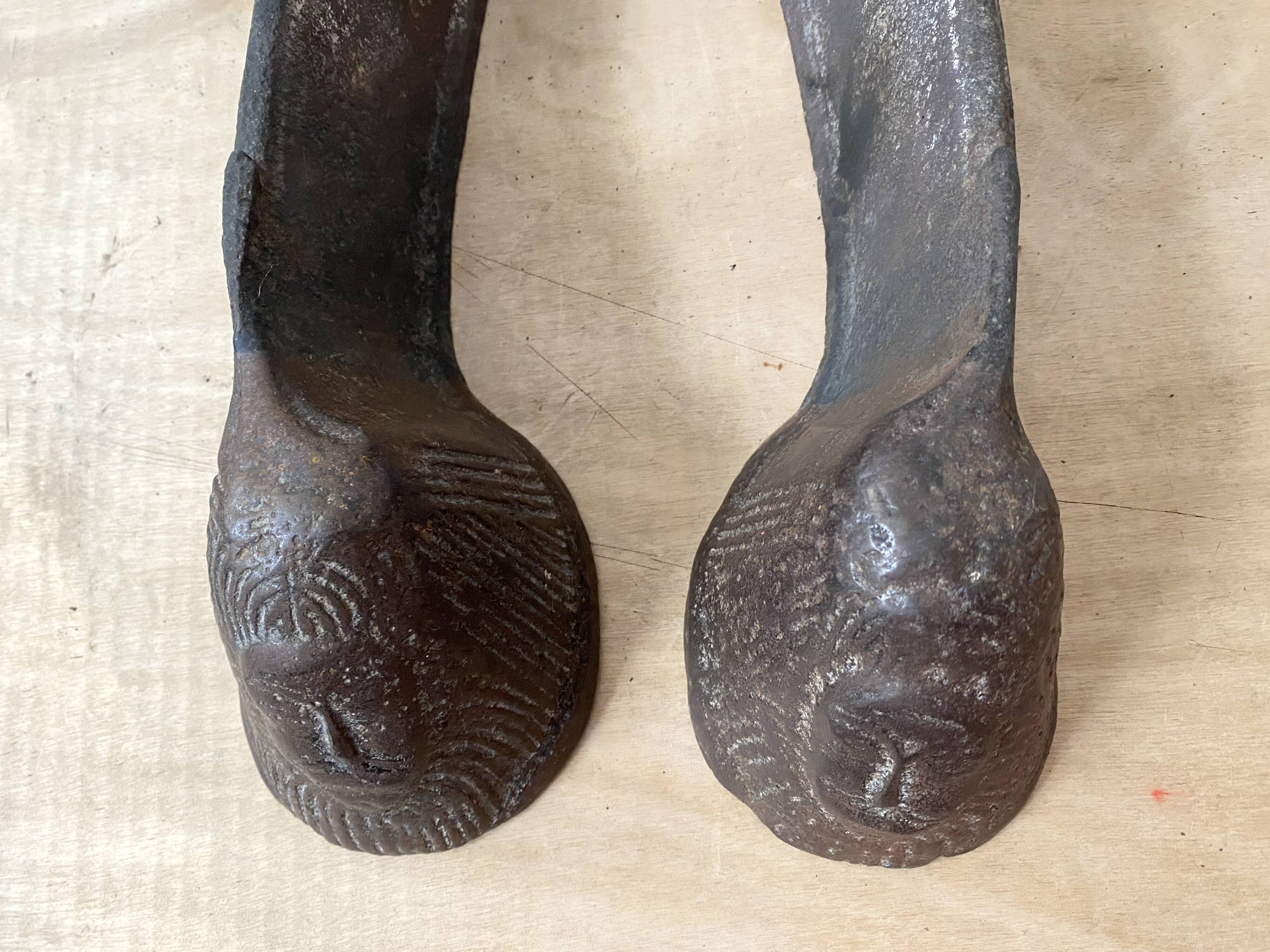 Pair of modernist anthropomorphic fireplace andirons, brutalist log holders 1950s