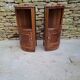 Corner bedside tables, in walnut