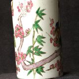Small vase roll decoration birds branches of cherry blossoms and flowers