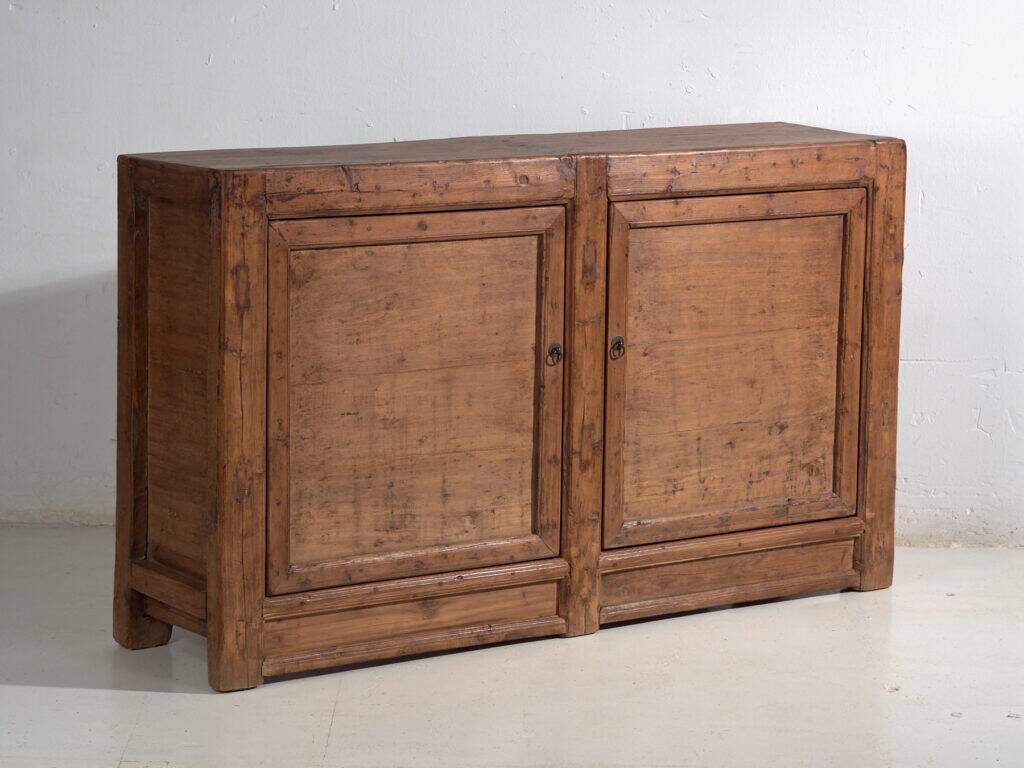 Chinese buffet high in carved pine with geometric panels – Gansu, circa 1930