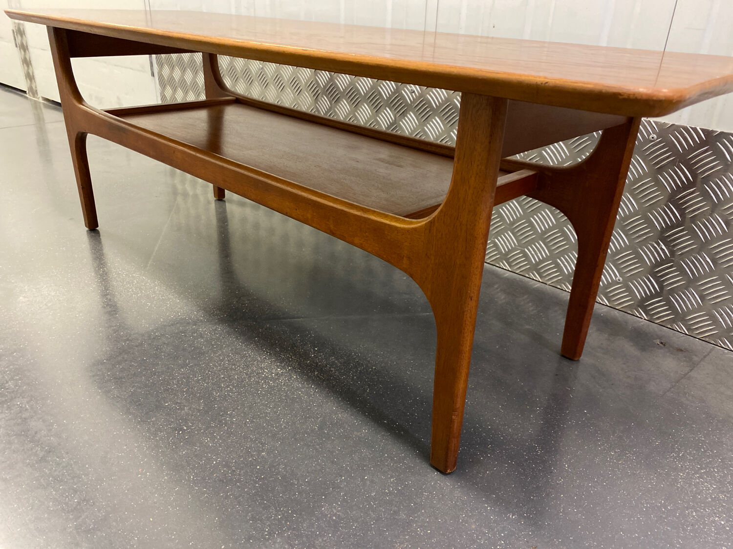 Teak coffee table with under top circa 1960