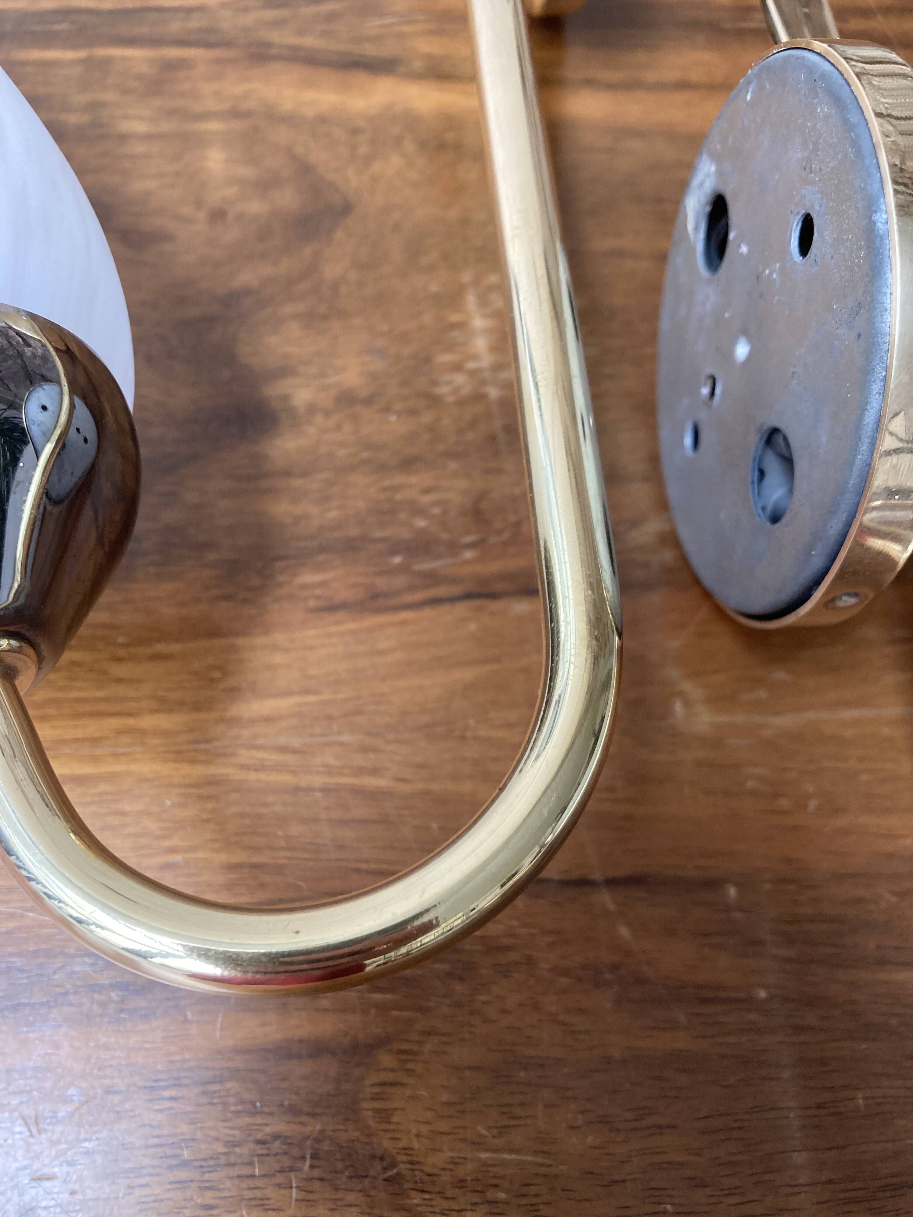 Pair of 50s gold and speckled globe wall lights