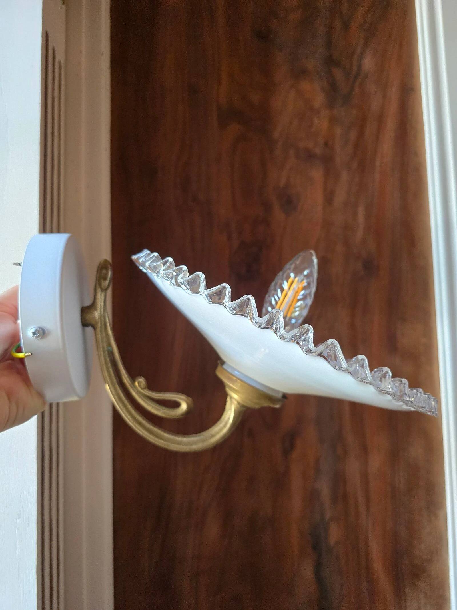 Pair of wall sconces in brass and wavy opaline glass