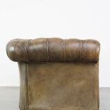 2.5 seater leather chesterfield sofa in a moss green color
