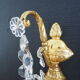 Paire d’appliques deux feux en bronze avec pampilles et guirlandes en cristal – Style Louis XV