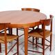 Round dining table in teak by Ib Kofod Larsen for Faarup Mobelfabrik