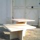 Two coffee tables giggle in travertine