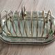 Foie gras presentation service dish in metal and glass and its toast holder