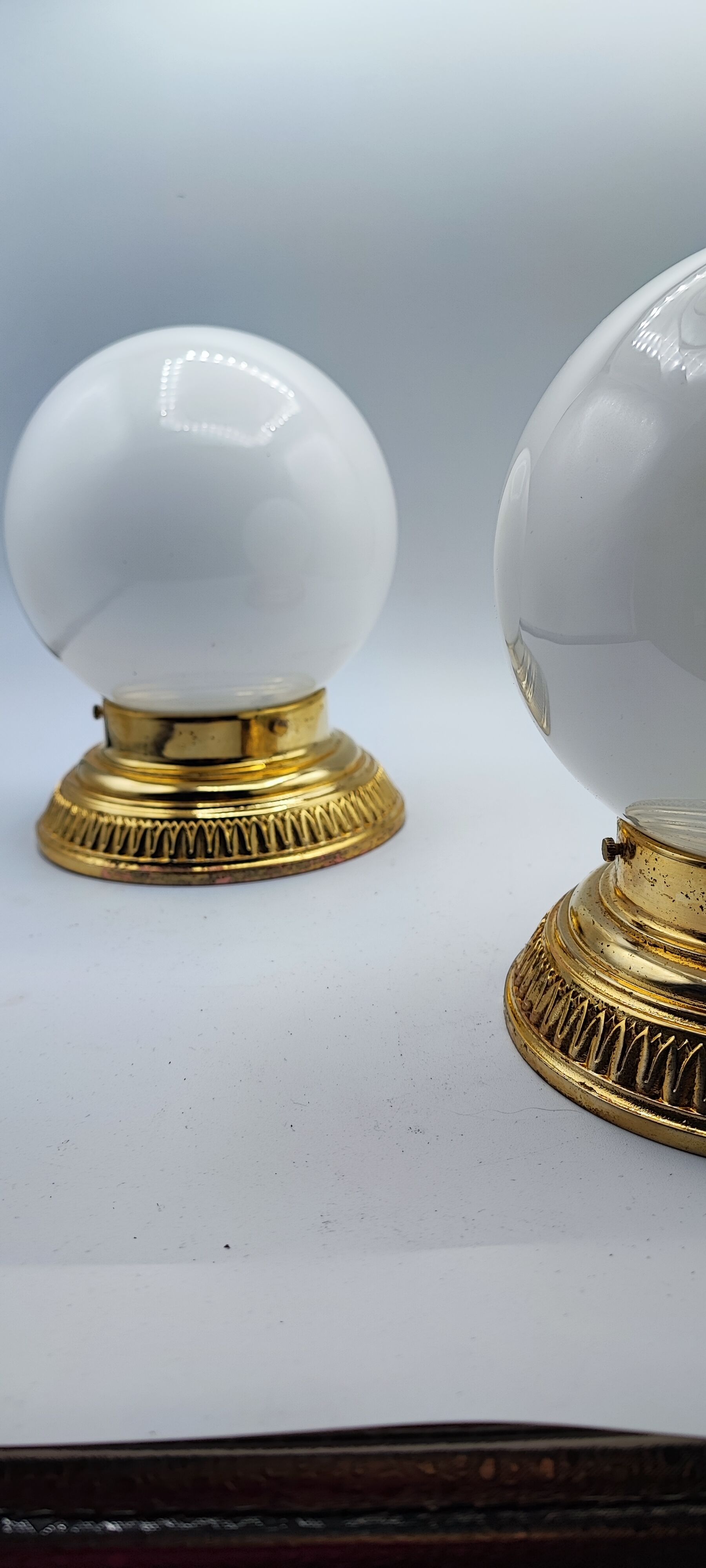 Pair of white opaline sconces