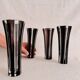 4 vintage champagne flutes in clear and black crystal glass