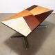 Vintage collection table Prisma, various essences, Italy, 1960s.