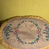 Hand-embroidered 1920s cushion