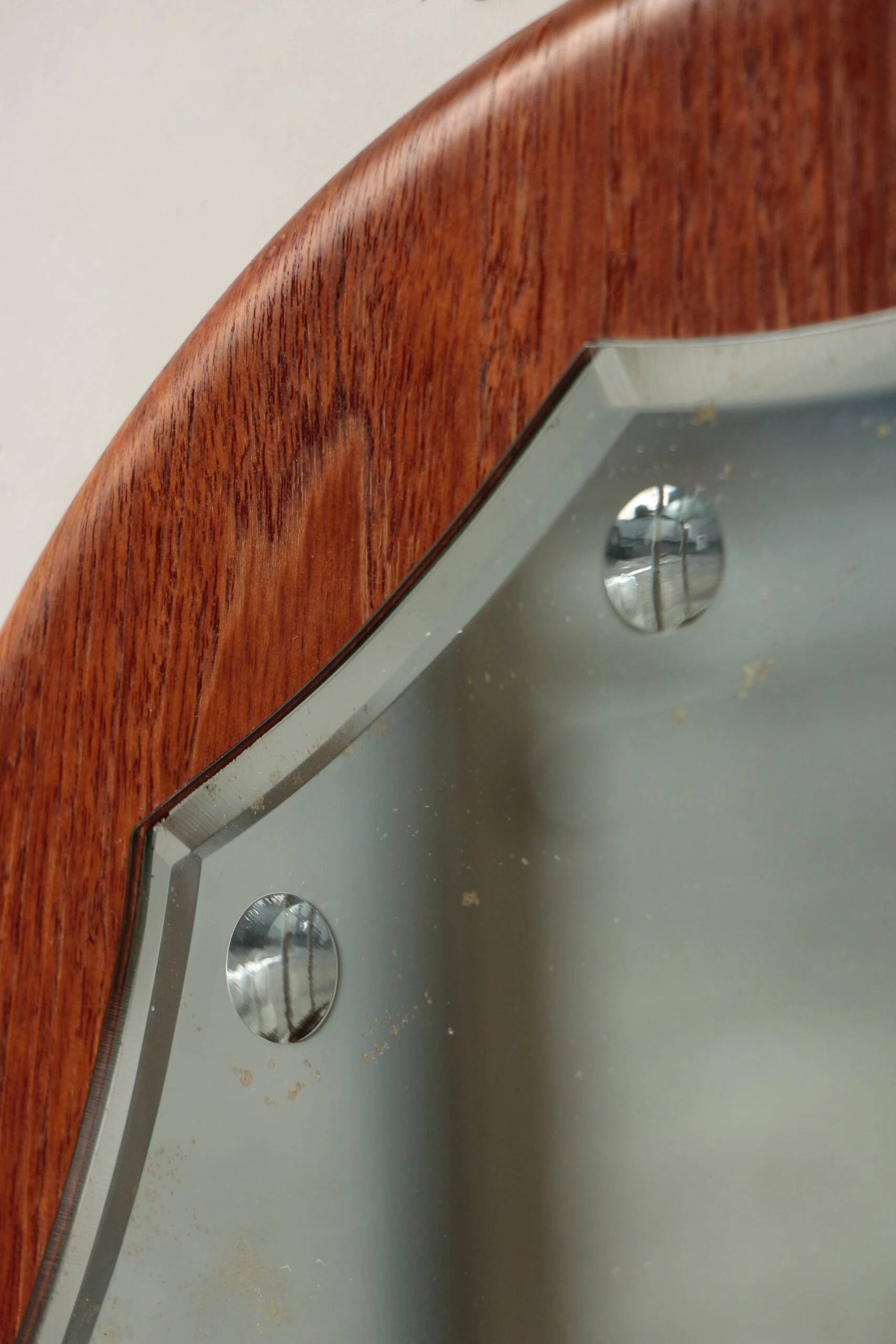 Vintage round teak mirror from the 1960s.