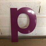 Purple letter "d" or "p"