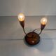 Simple double-headed table lamp in wood and brass, 1960s, Germany.