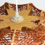 Brown wire and wood pendant light.