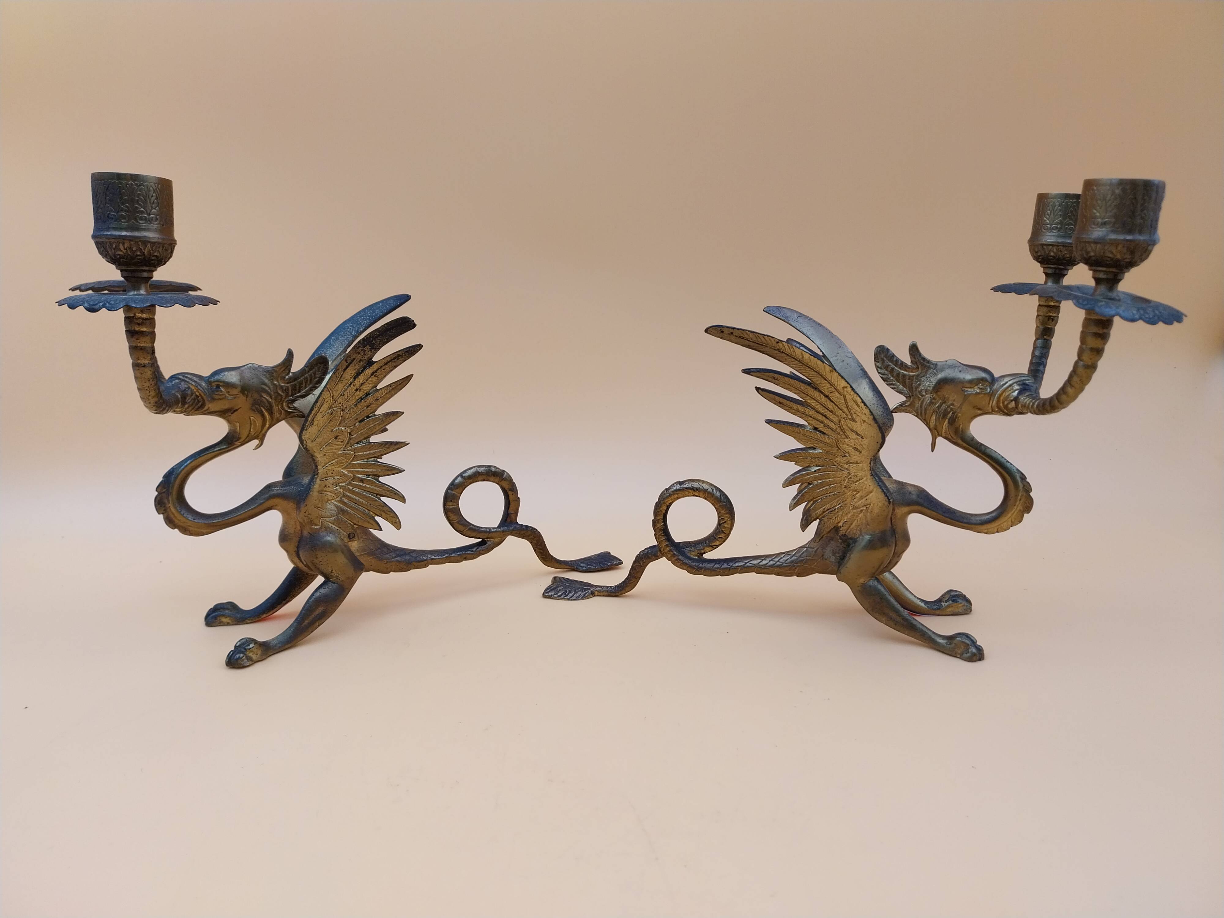 Pair of bronze candlesticks with chimera dragons