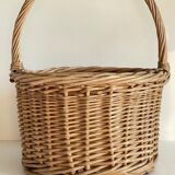 Basket with vintage rattan bottles