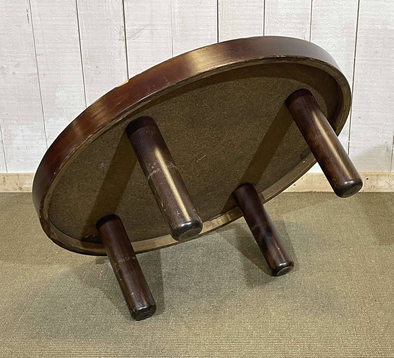 Beech coffee table with a ceramic top featuring a herbarium design.