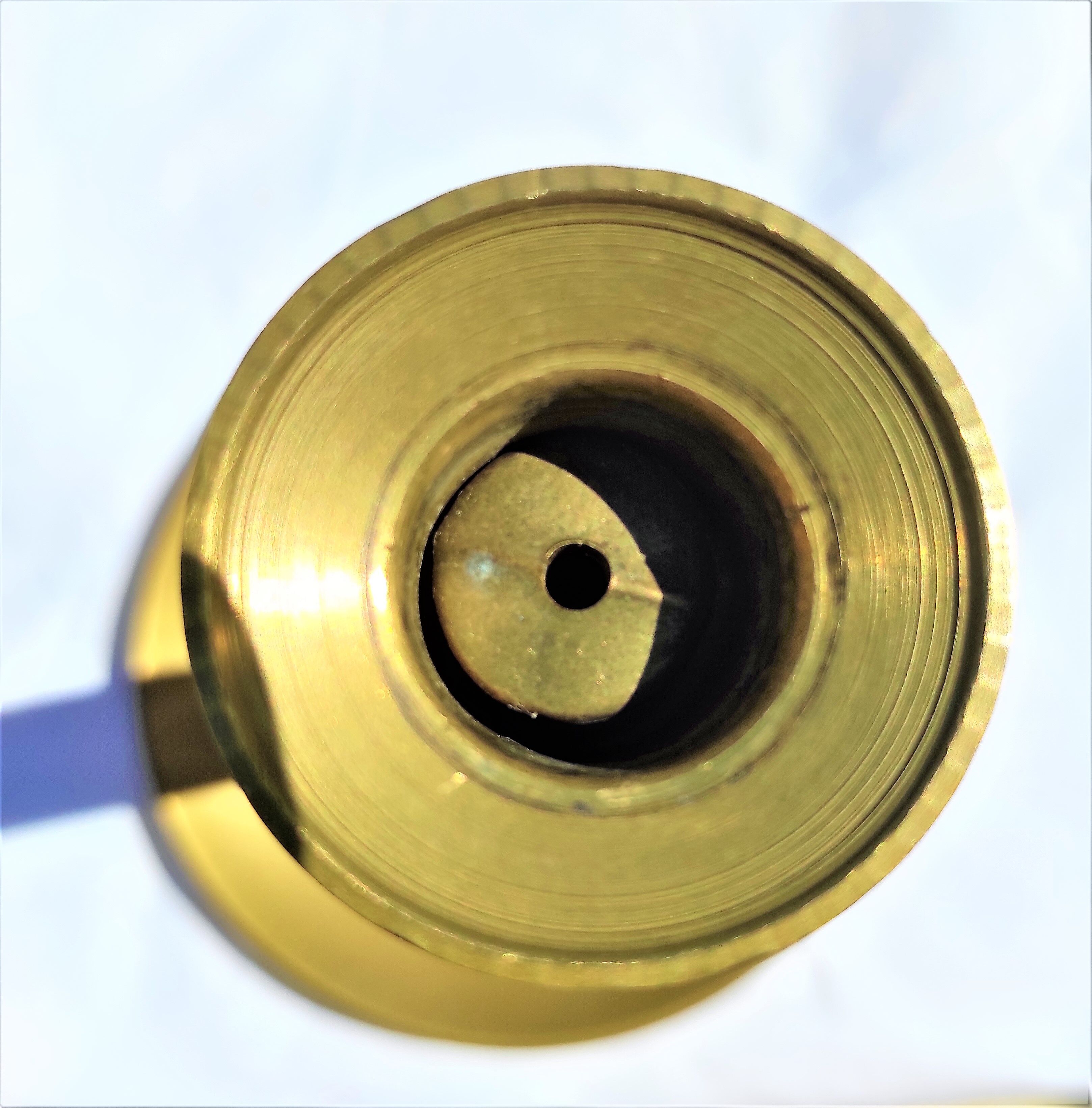 Antique brass candle holder