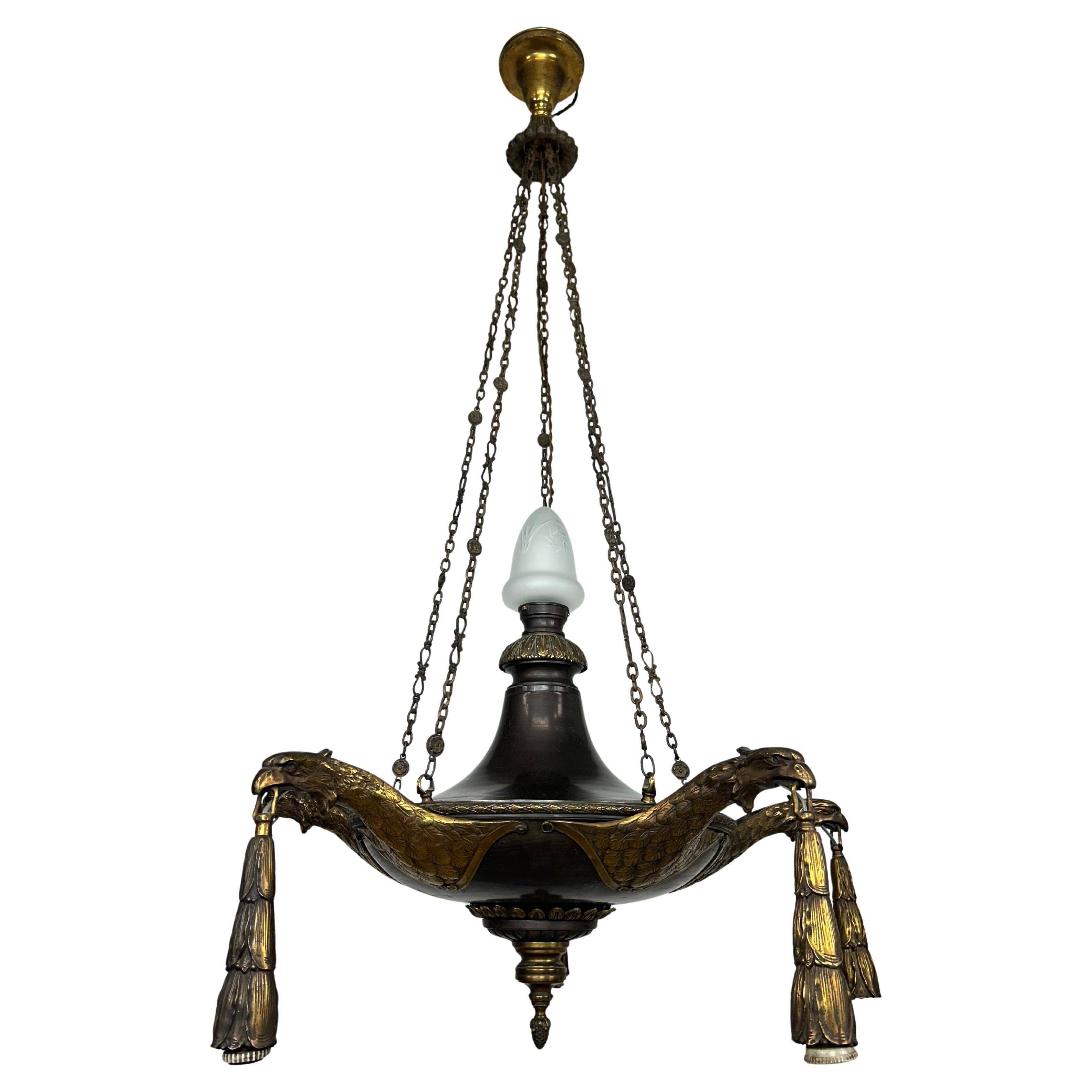 Extraordinary Art Deco chandelier with bronze eagles.