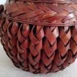 Japanese vase made of woven bamboo. Ikebana.