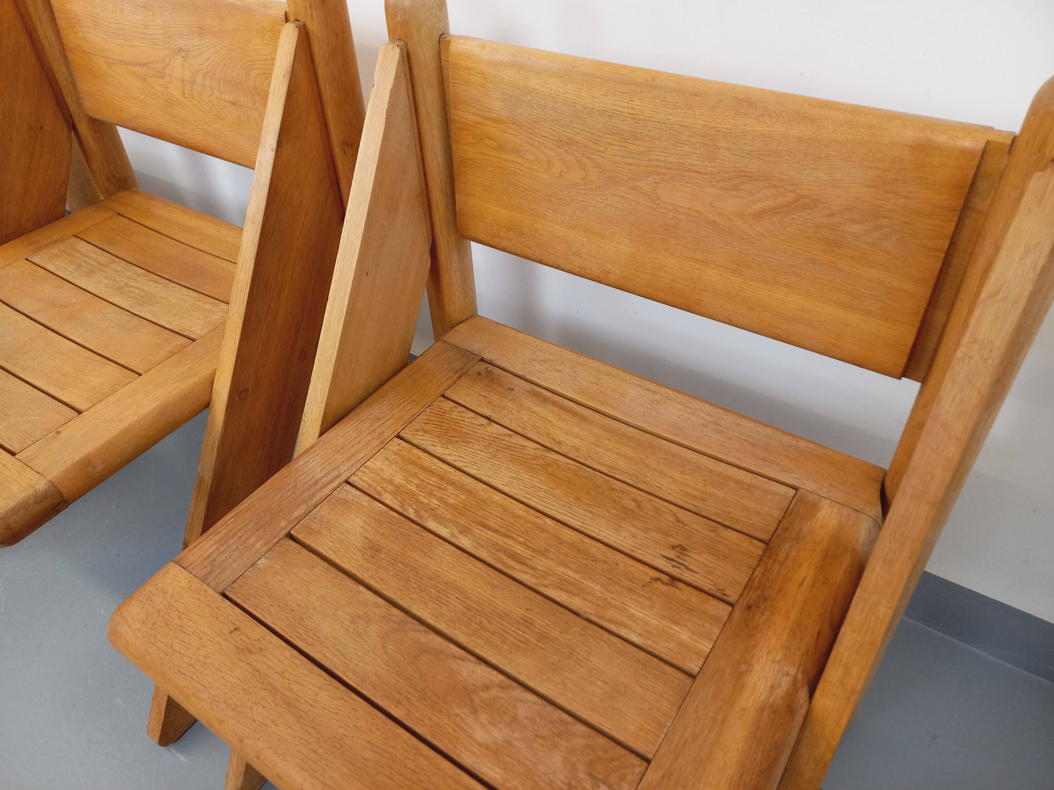 Set of 4 vintage brutalist chairs in solid oak from the 1960s.