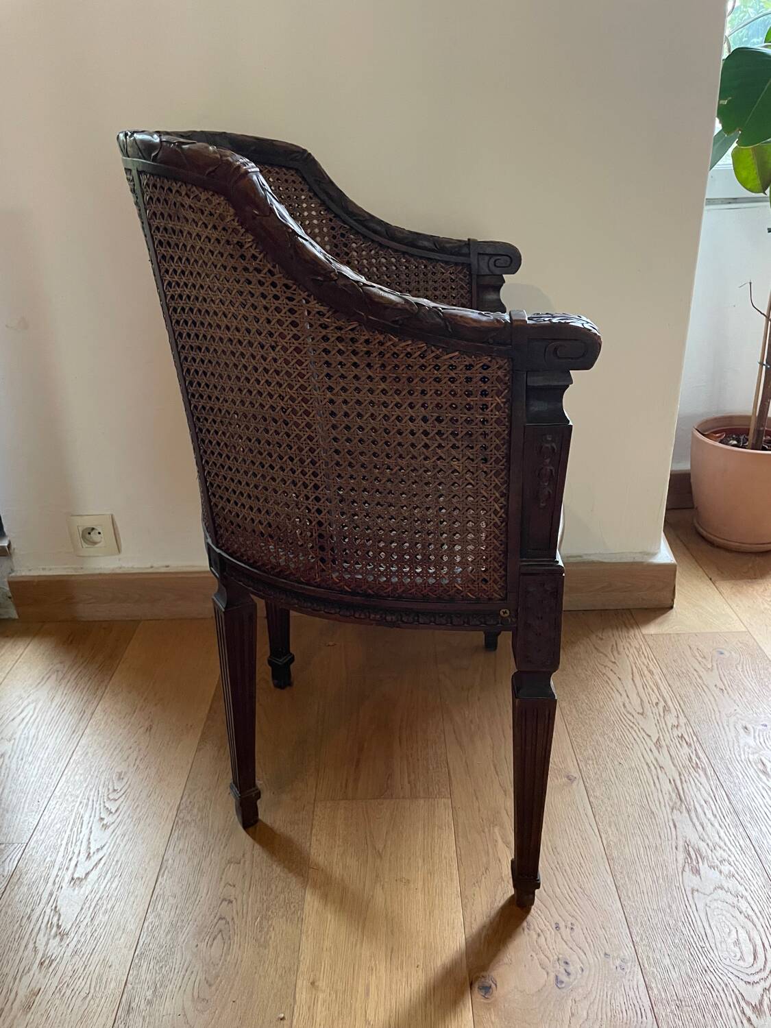 Pair of gondola armchairs in Louis XVI style with caning.