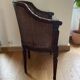 Pair of gondola armchairs in Louis XVI style with caning.