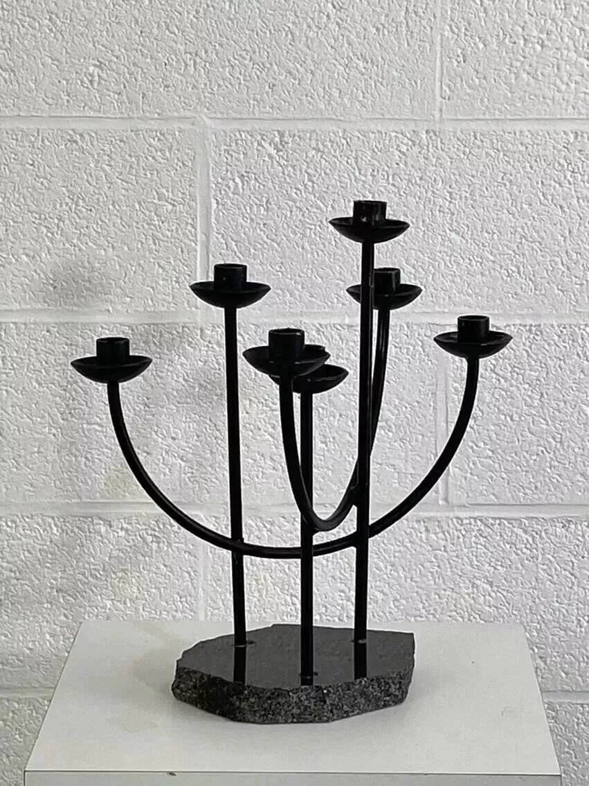 Metal candle holder and black quartz base