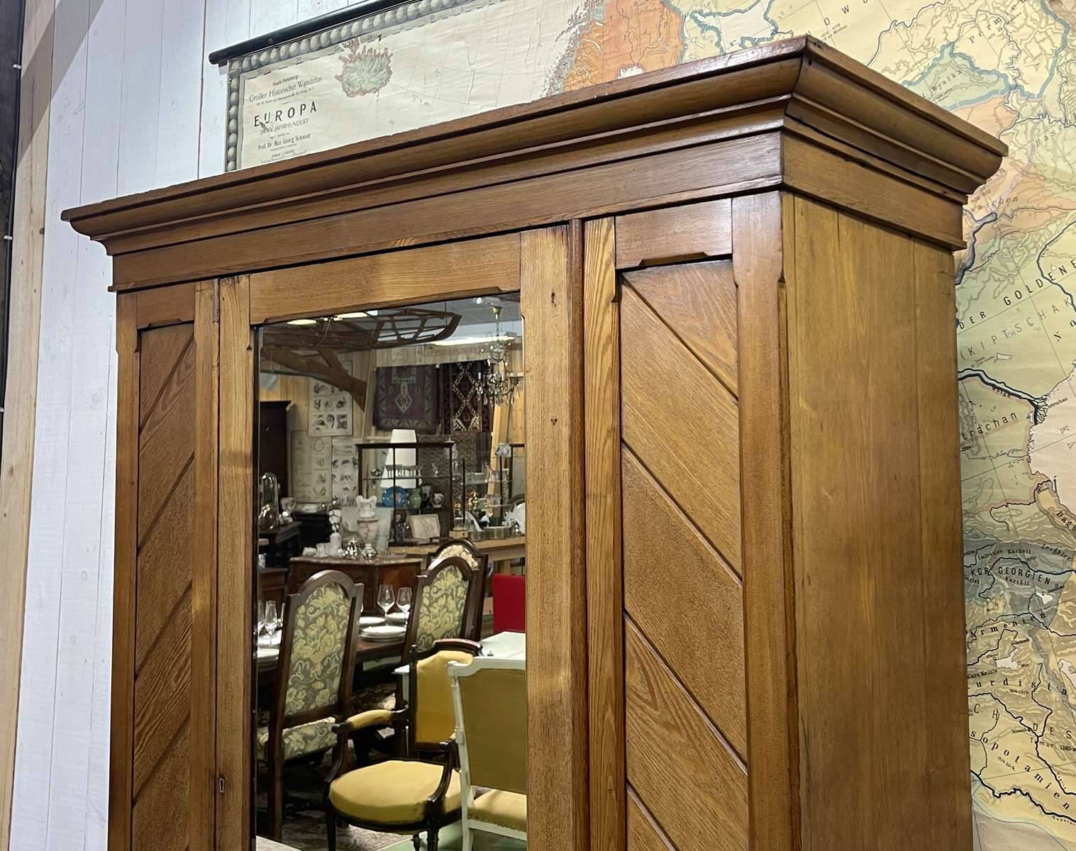 English oak wardrobe from the early 20th century.