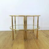 Pairs of gilded metal bedside tables and glass tops