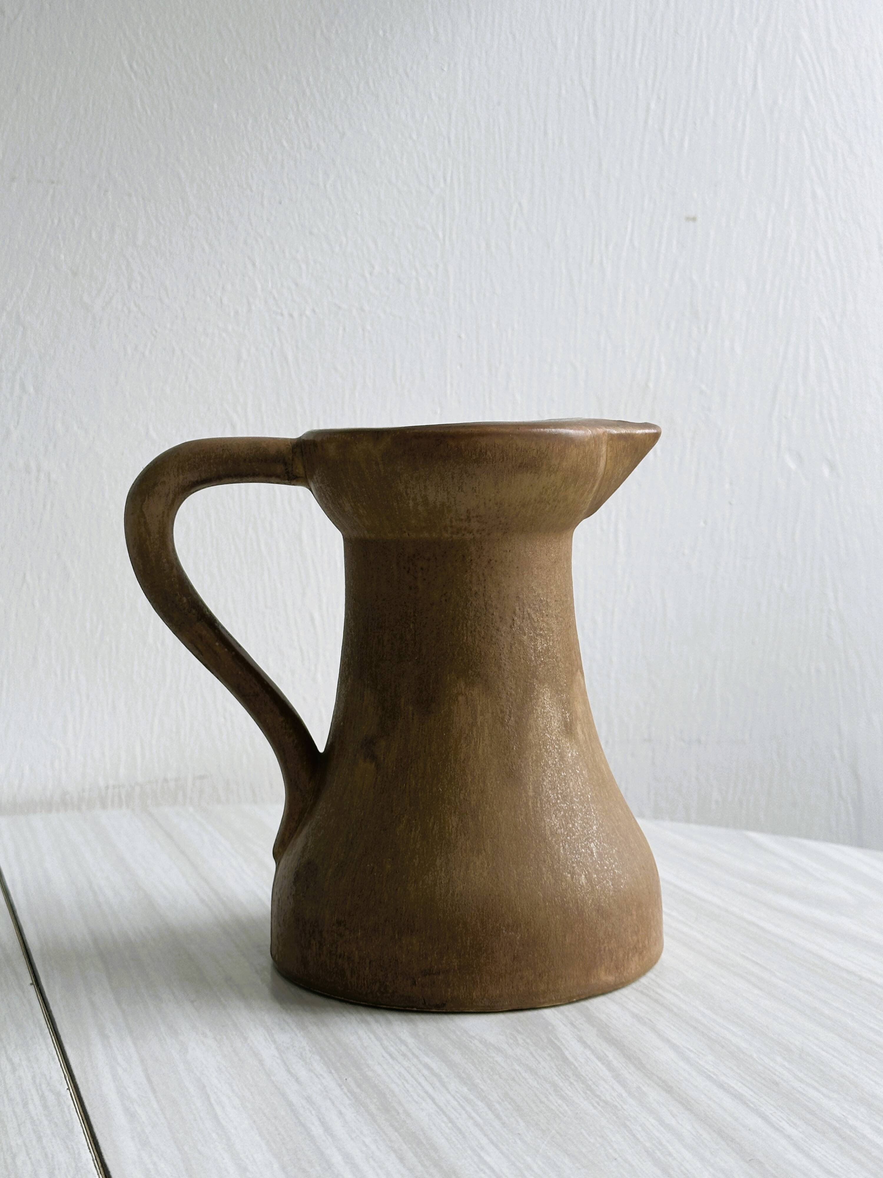 Stoneware pitcher - utensil pot.