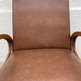 Mid-Century Scandinavian vintage retro armchair with oval armrests.