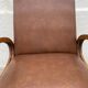 Mid Century Scandinavian vintage retro armchair with oval armrests.