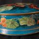 Antique porcelain candy box with floral motifs