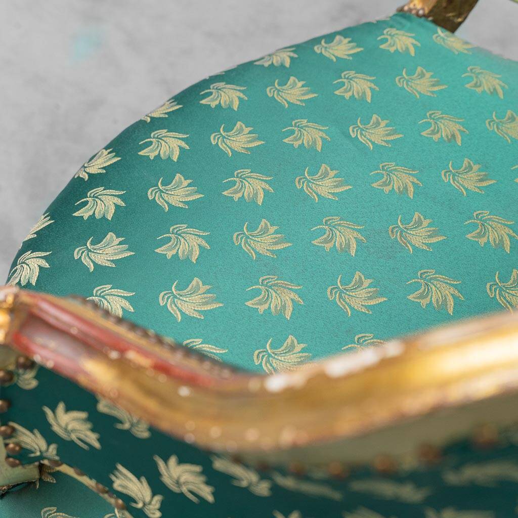 Pair of Louis XV style gilded armchairs with vintage green fabric