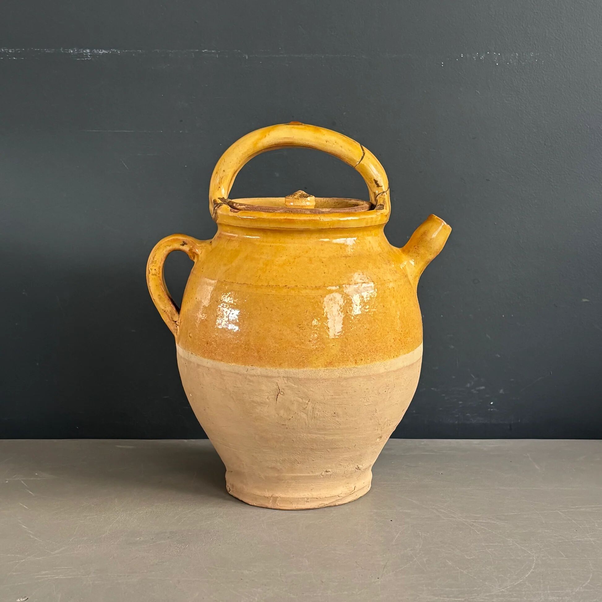 Ancient oil jar in glazed terracotta
