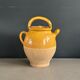 Ancient oil jar in glazed terracotta