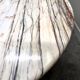 Large oval Italian Arabescato Rosso marble dining table – 1970s sculptural stone