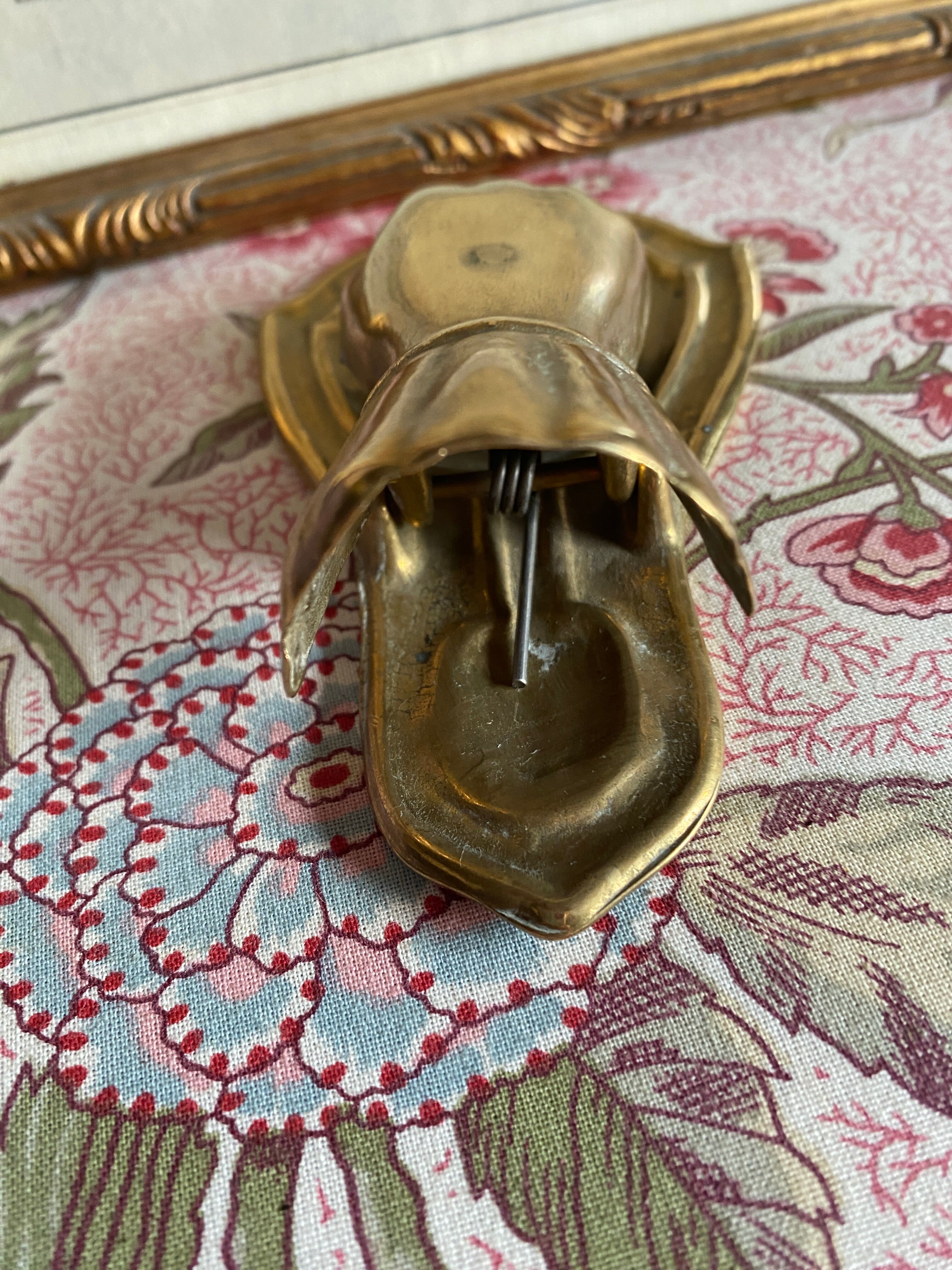 Antique gilded brass mail clip