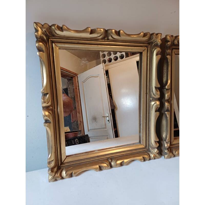 Pair of wood and gilded stucco mirrors