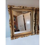 Pair of wood and gilded stucco mirrors