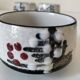 Three glazed ceramic bowls with raised graphic decoration, 1970s.