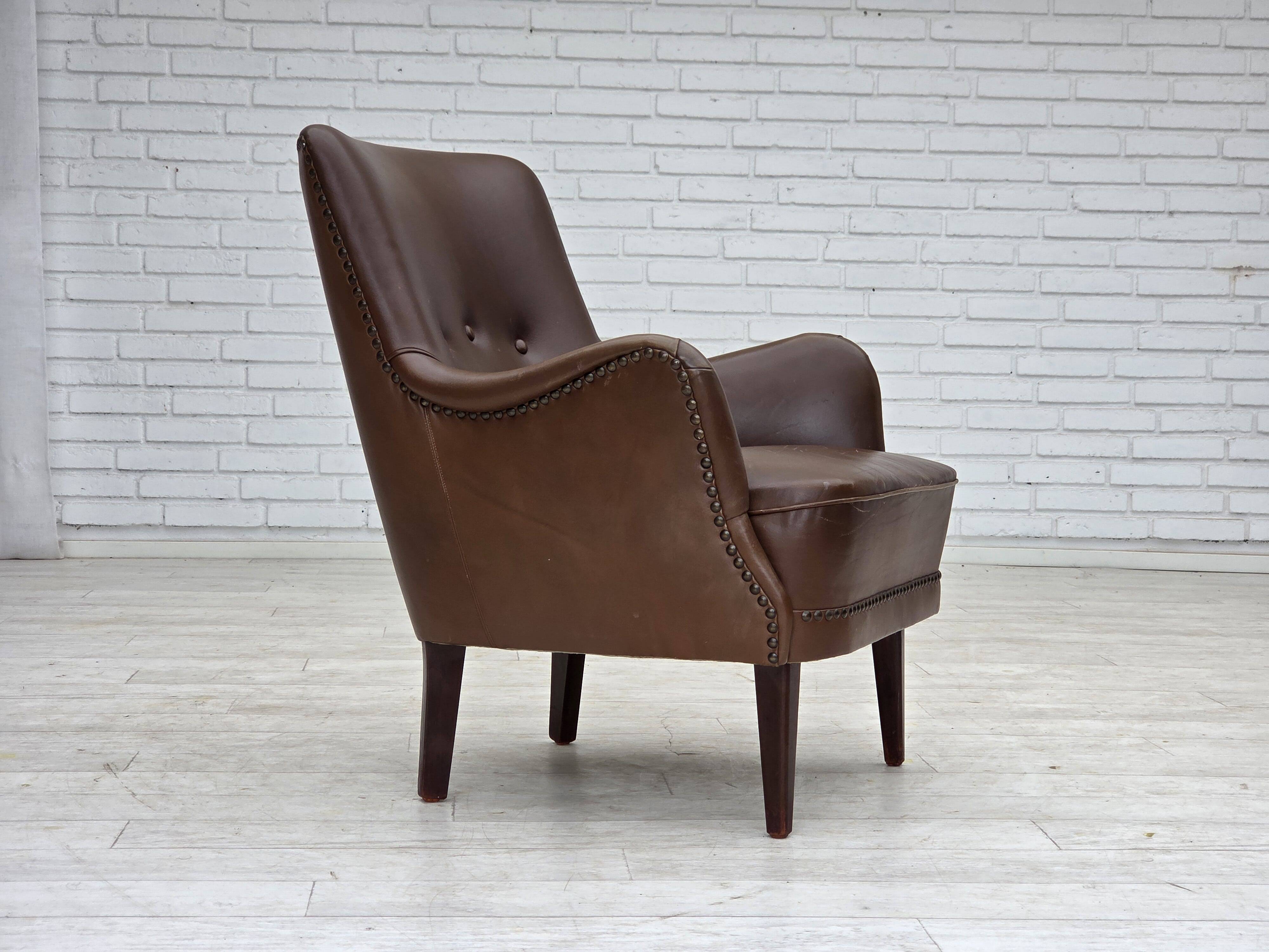 1960s, Danish armchair, furniture leather, ash wood legs.