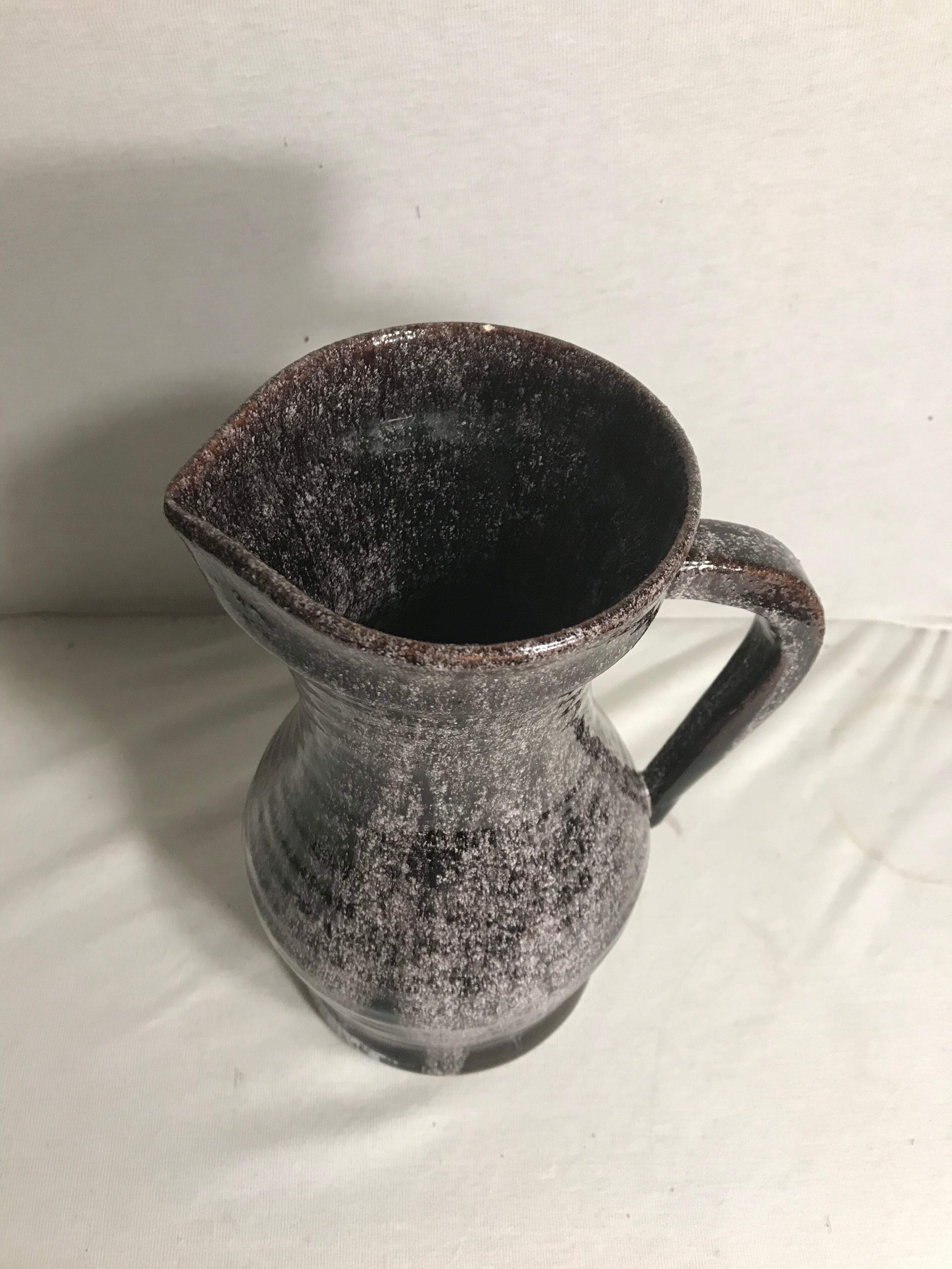 Old ceramic accolay jug, grey-black
