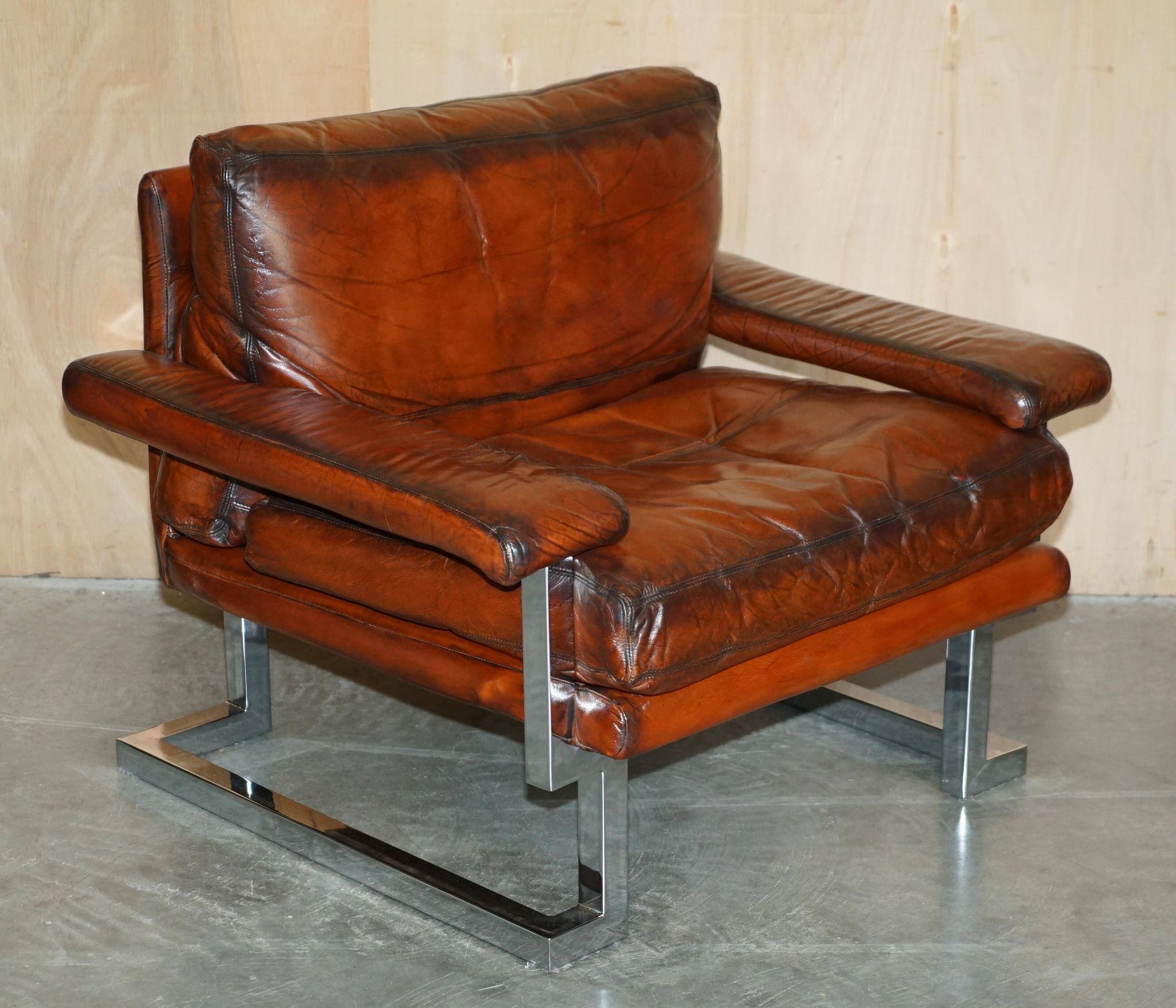 Restored suite Tim Bates for Pieff Mandarin leather chrome hardwood.