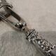 Silver-plated metal leg of lamb handle in art nouveau style