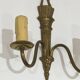 Pair of Louis XVI style bronze wall sconces with quivers and ribbons